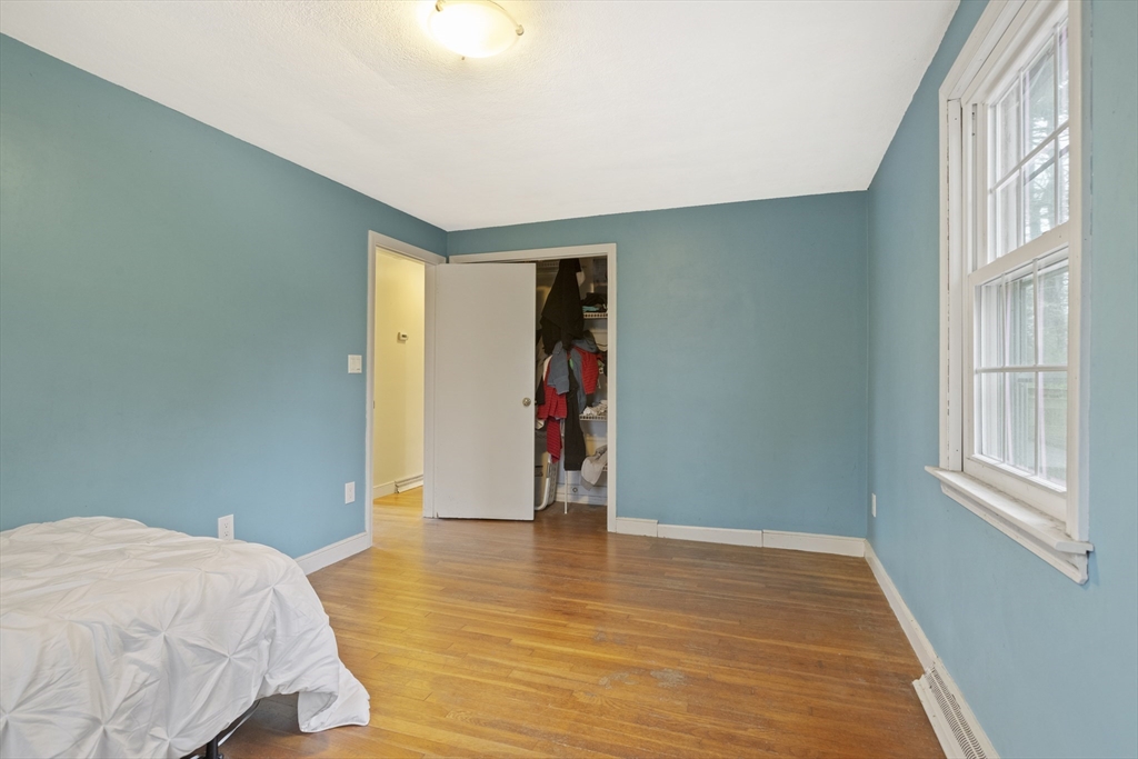 283 Orchard Street Millis, MA 02054 - Photo 19 of 41 a bed room with a bed and a window