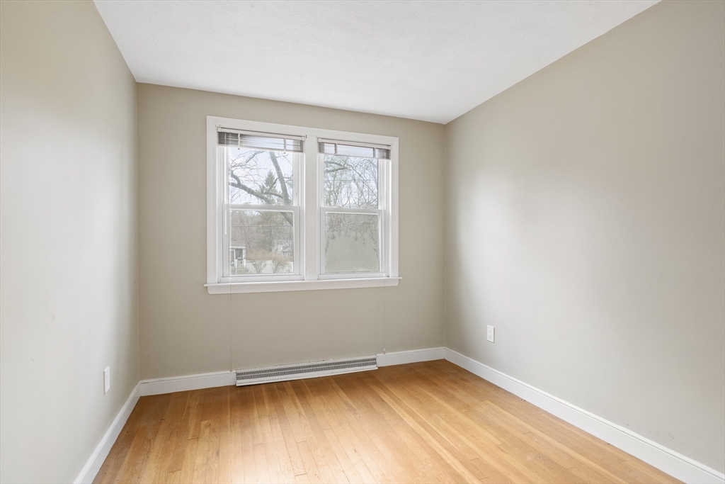 283 Orchard Street Millis, MA 02054 - Photo 21 of 41 an empty room with a window
