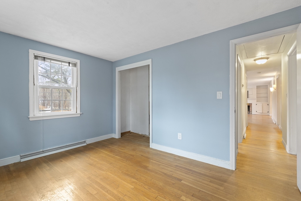 283 Orchard Street Millis, MA 02054 - Photo 22 of 41 a view of empty room with wooden floor