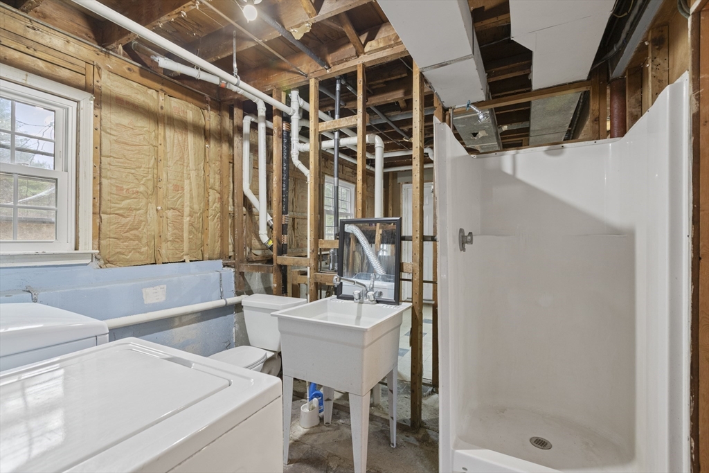 283 Orchard Street Millis, MA 02054 - Photo 28 of 41 a bathroom with a sink and a bathtub