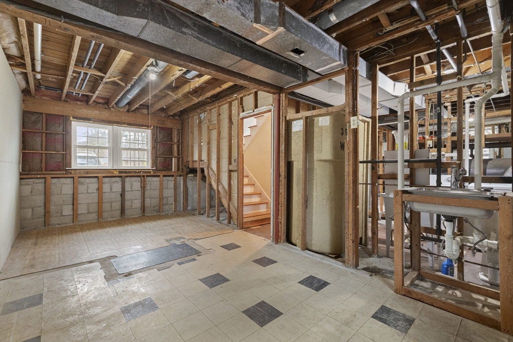283 Orchard Street Millis, MA 02054 - Photo 29 of 41 a view of a hallway with windows