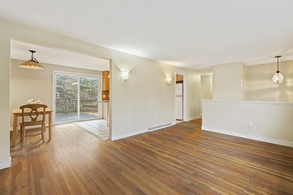 283 Orchard Street Millis, MA 02054 - Photo 3 of 41 a view of livingroom with furniture and wooden floor