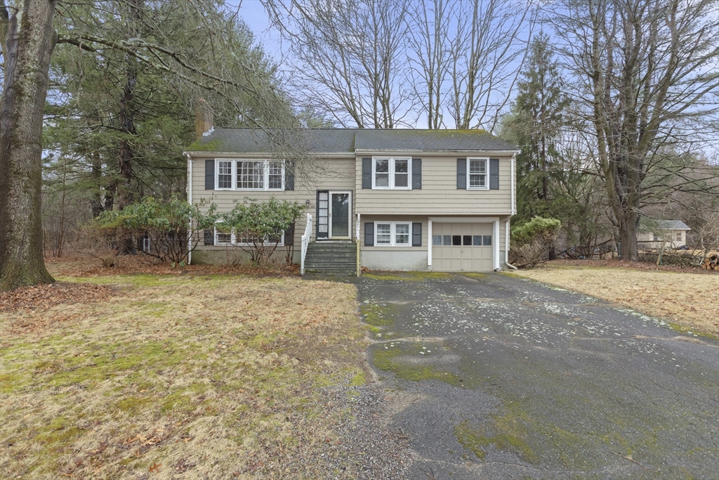 283 Orchard Street Millis, MA 02054 - Photo 40 of 41 front view of a house with a yard