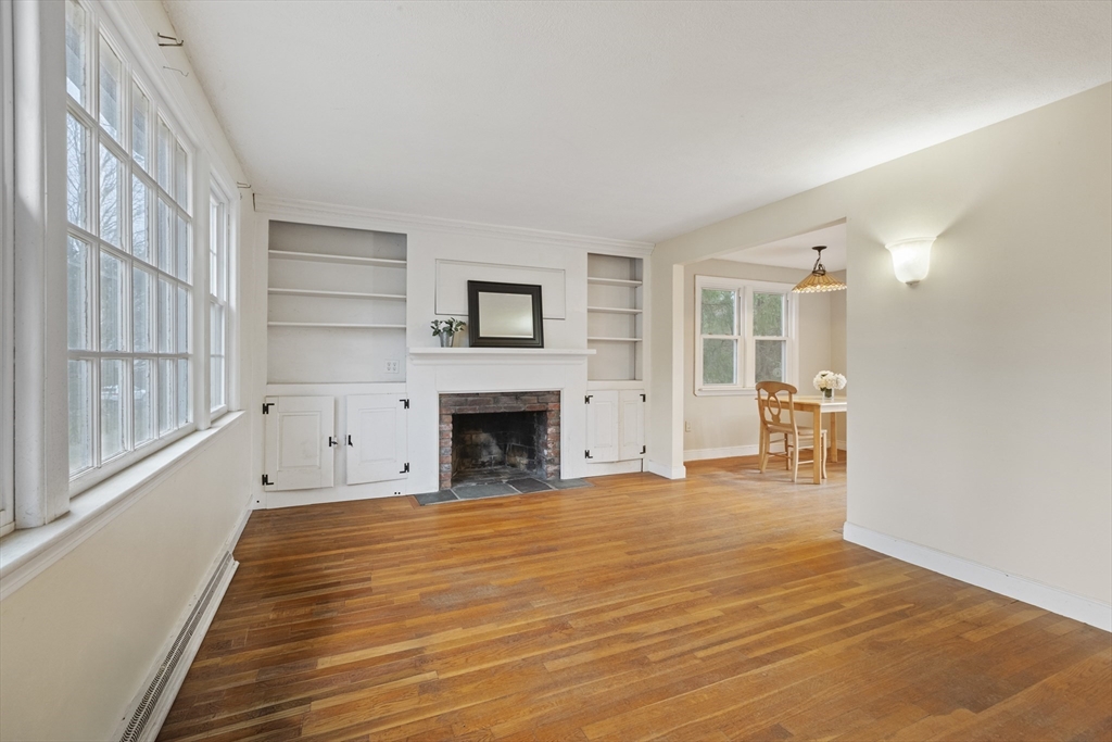 283 Orchard Street Millis, MA 02054 - Photo 5 of 41 a view of empty room with wooden floor and a window