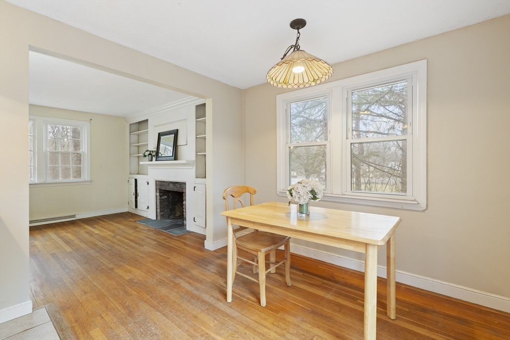 283 Orchard Street Millis, MA 02054 - Photo 6 of 41 a view of a dining room with furniture window and wooden floor