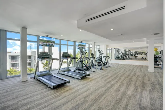 a view of a building with outdoor seating