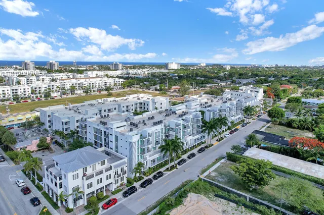 a view of a city with lots of trees