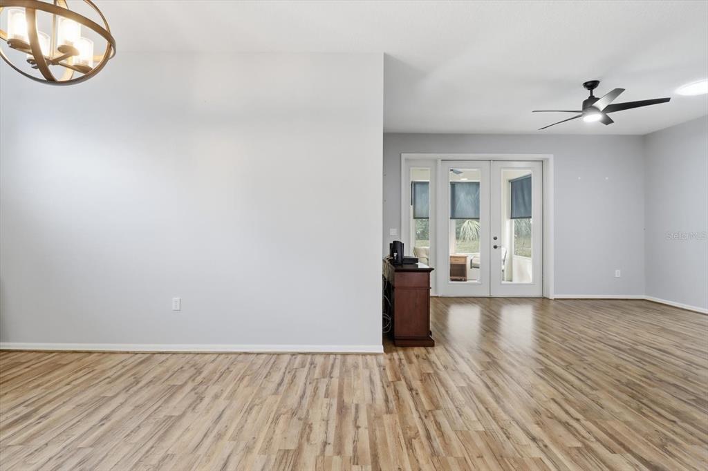 3569 South Belgrave Drive Inverness, FL 34452 - Photo 11 of 70 a view of a livingroom with wooden floor