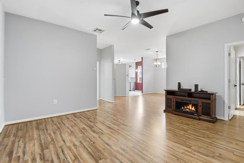 3569 South Belgrave Drive Inverness, FL 34452 - Photo 14 of 70 a view of a livingroom with furniture and wooden floor