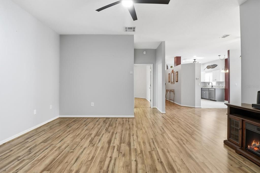 3569 South Belgrave Drive Inverness, FL 34452 - Photo 16 of 70 a view of empty room with wooden floor