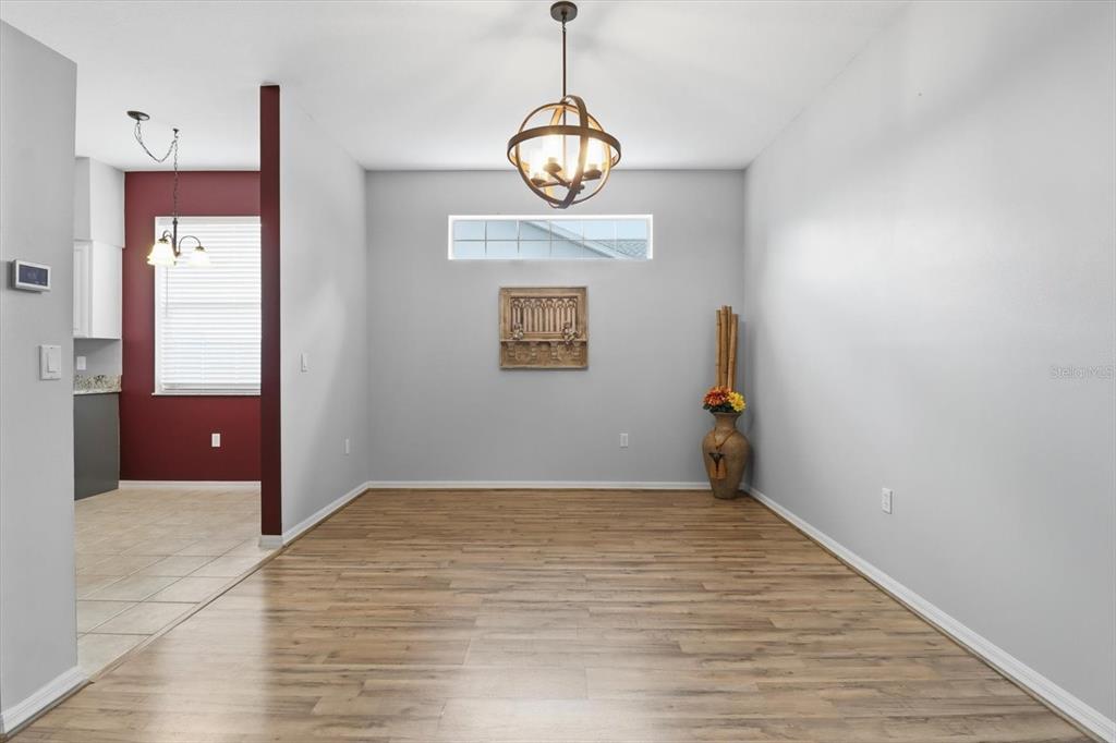 3569 South Belgrave Drive Inverness, FL 34452 - Photo 17 of 70 a view of an entryway with wooden floor