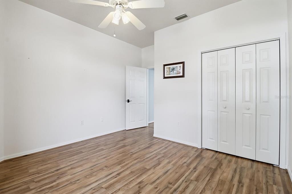 3569 South Belgrave Drive Inverness, FL 34452 - Photo 30 of 70 a view of an empty room with wooden floor