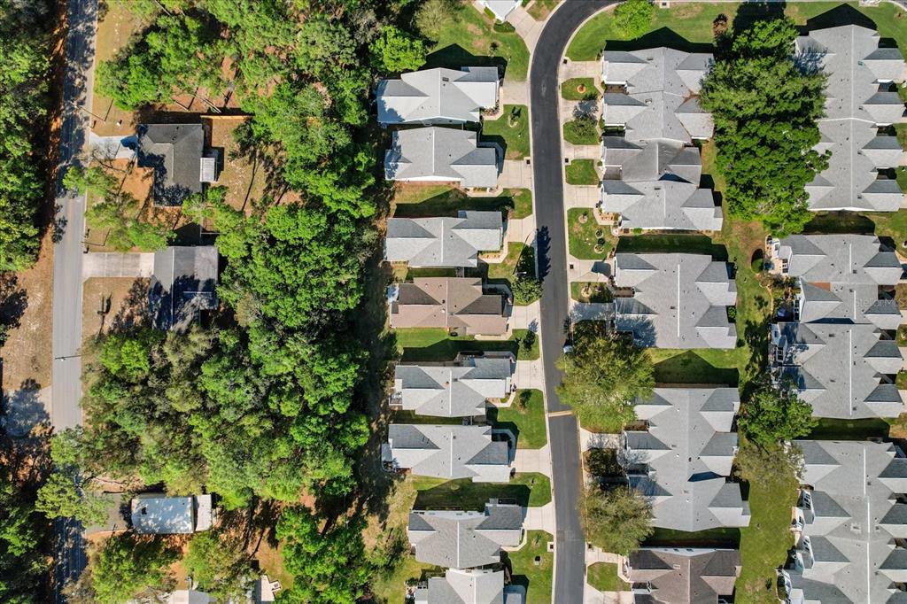 3569 South Belgrave Drive Inverness, FL 34452 - Photo 45 of 70 an aerial view of residential houses with yard