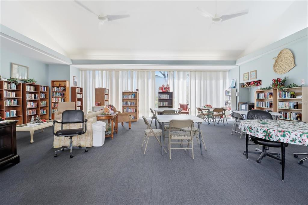 3569 South Belgrave Drive Inverness, FL 34452 - Photo 56 of 70 a living room with furniture and a large window