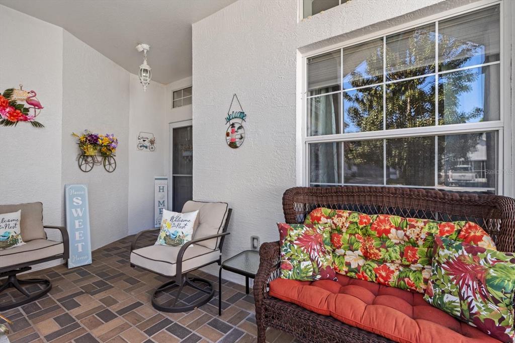 3569 South Belgrave Drive Inverness, FL 34452 - Photo 6 of 70 a bed sitting in a bedroom next to a window