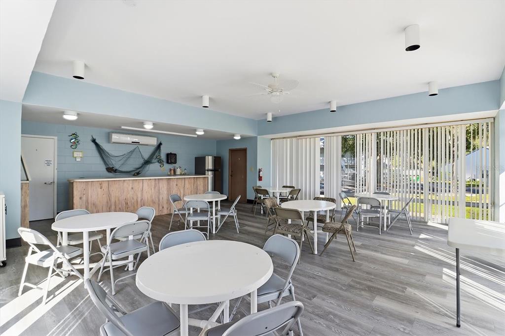 3569 South Belgrave Drive Inverness, FL 34452 - Photo 66 of 70 a view of a dining room with furniture window and wooden floor