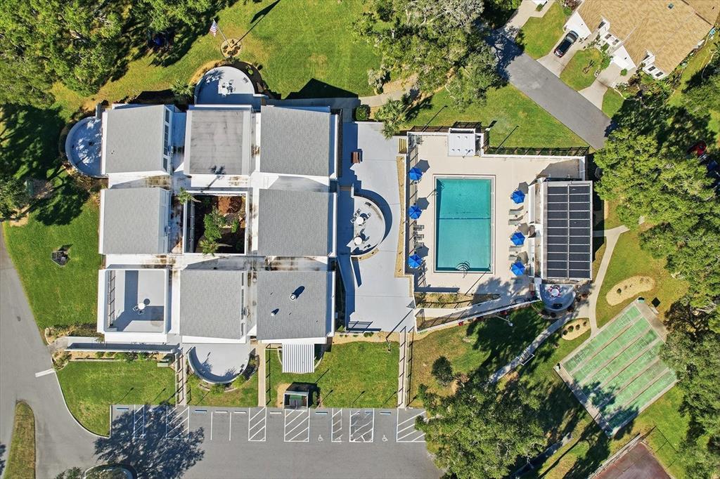 3569 South Belgrave Drive Inverness, FL 34452 - Photo 68 of 70 an aerial view of a house with swimming pool and large trees