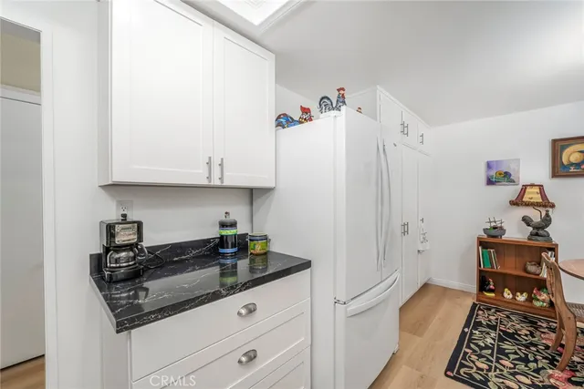 a kitchen with stainless steel appliances a stove and a refrigerator