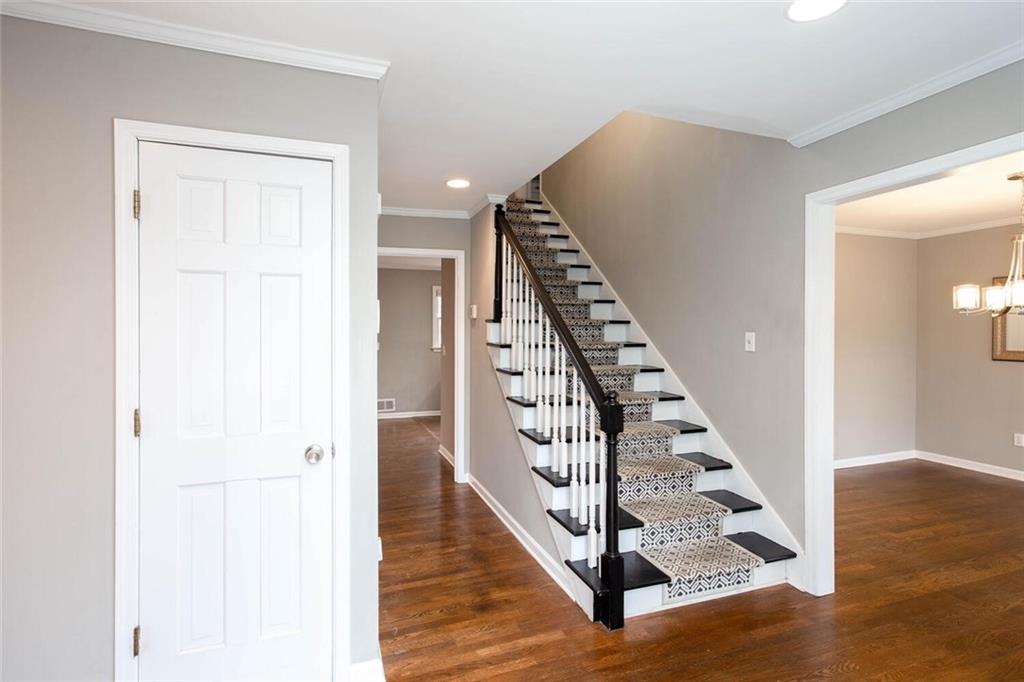 1066 Foreststone Way Marietta, GA 30064 - Photo 2 of 53 a view of a hallway with wooden floor and entryway