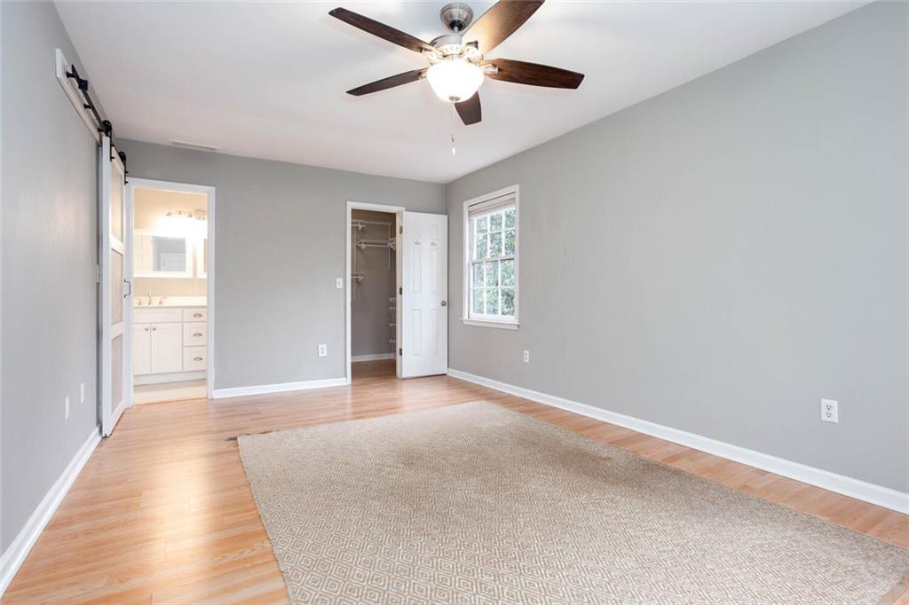 1066 Foreststone Way Marietta, GA 30064 - Photo 22 of 53 a view of an empty room with a window