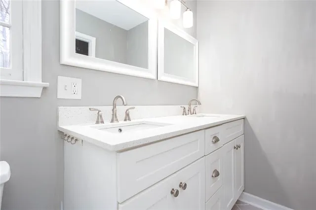 a bathroom with a sink a toilet and a bathtub