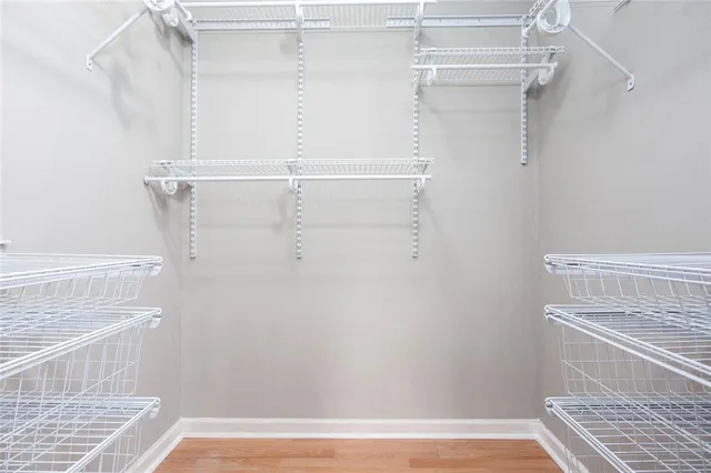 a view of a hallway with washer and dryer