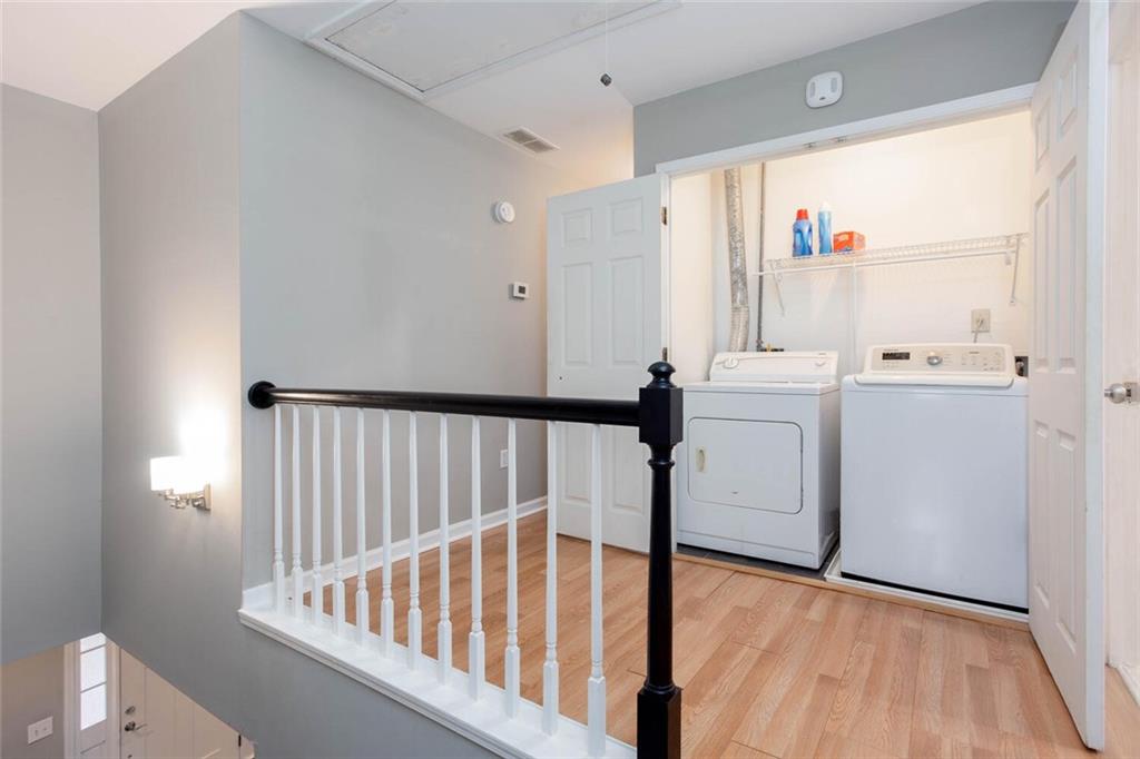 1066 Foreststone Way Marietta, GA 30064 - Photo 28 of 53 a view of a hallway with washer and dryer