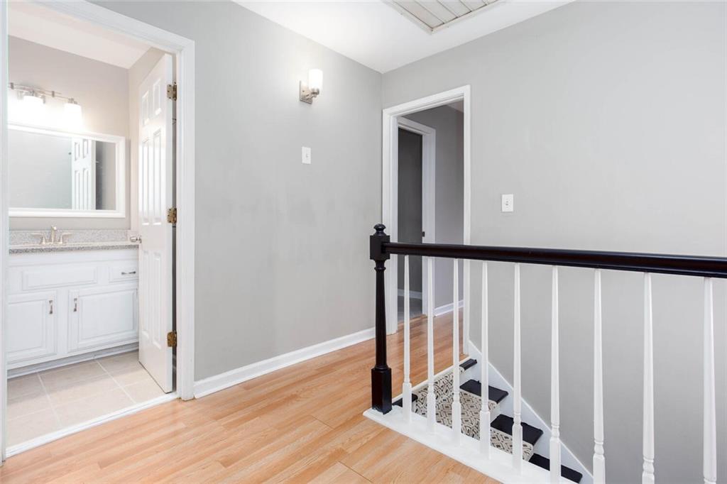1066 Foreststone Way Marietta, GA 30064 - Photo 29 of 53 a view of a hallway with wooden floor and entryway