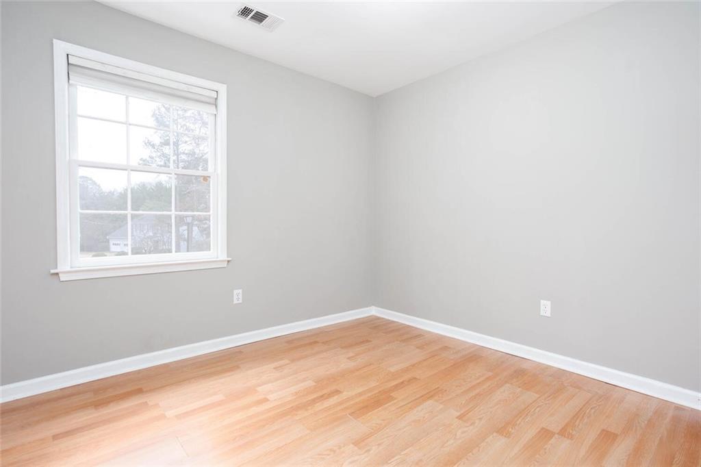 1066 Foreststone Way Marietta, GA 30064 - Photo 32 of 53 an empty room with a window
