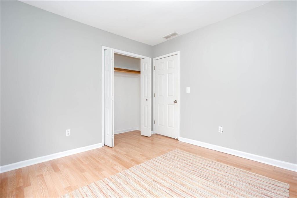 1066 Foreststone Way Marietta, GA 30064 - Photo 39 of 53 a view of a room with wooden floor and bathroom