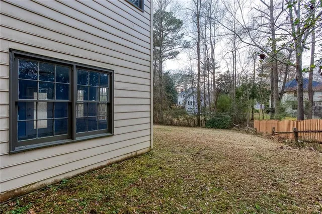 a view of a patio with a backyard