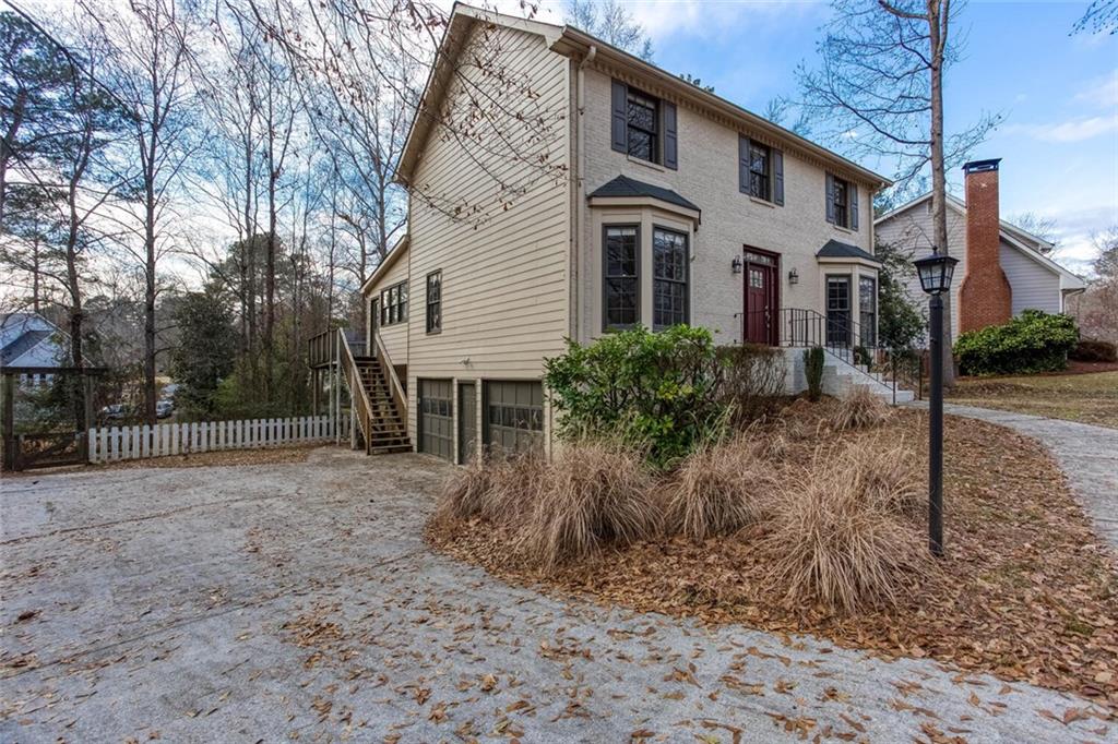 1066 Foreststone Way Marietta, GA 30064 - Photo 51 of 53 a view of a house with a yard