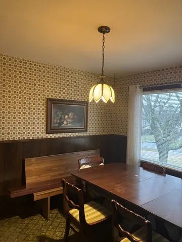 a view of a livingroom with furniture and window