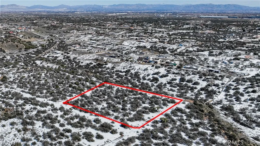 0 El Centro Road Oak Hills, CA 92344 - Photo 2 of 6 an aerial view of a red and white house