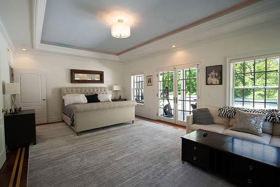 5 Clocks Lane Darien, CT 06820 - Photo 14 of 35 a living room with furniture and a large window