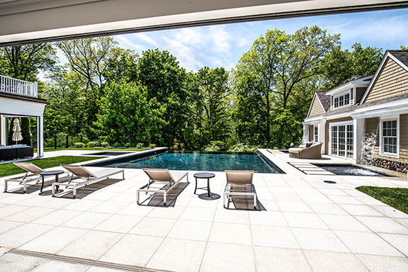 5 Clocks Lane Darien, CT 06820 - Photo 24 of 35 a view of swimming pool with seating space