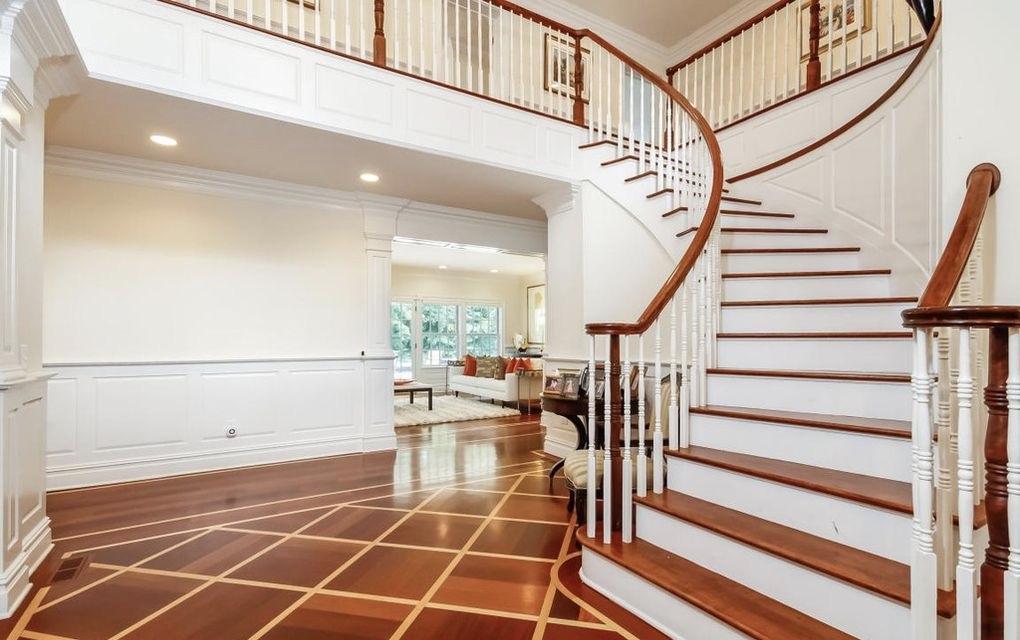 5 Clocks Lane Darien, CT 06820 - Photo 3 of 35 a view of entryway with wooden floor