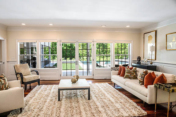 5 Clocks Lane Darien, CT 06820 - Photo 4 of 35 a living room with furniture and a large window