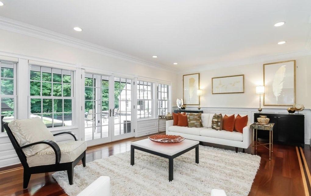 5 Clocks Lane Darien, CT 06820 - Photo 6 of 35 a living room with furniture and a rug
