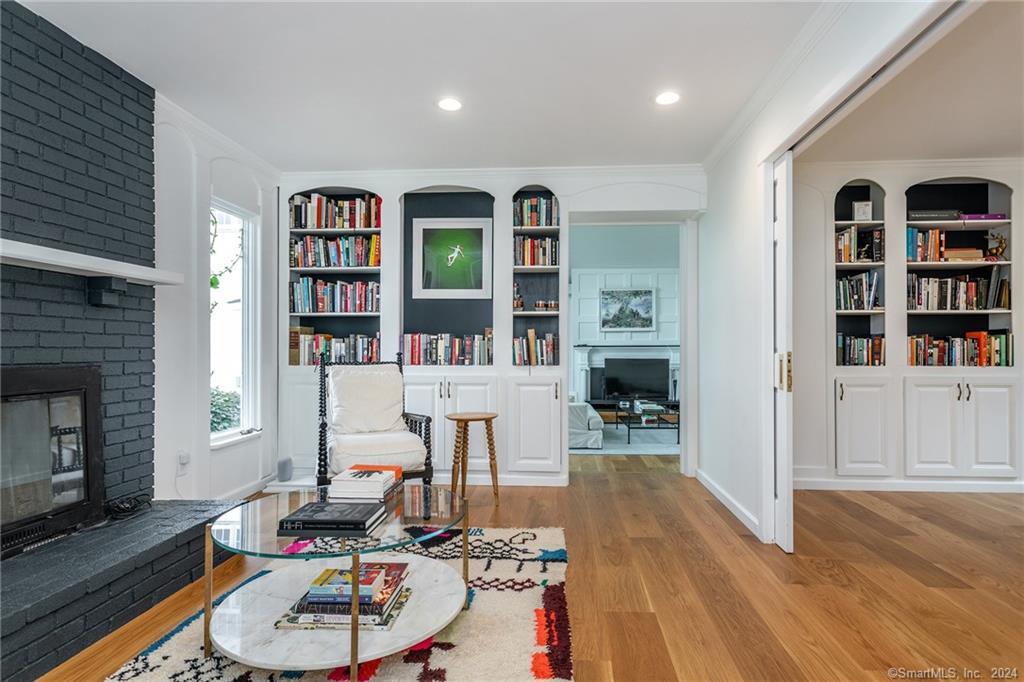 28 Leavenworth Road Woodbury, CT 06798 - Photo 11 of 37 a living room with furniture and a fireplace