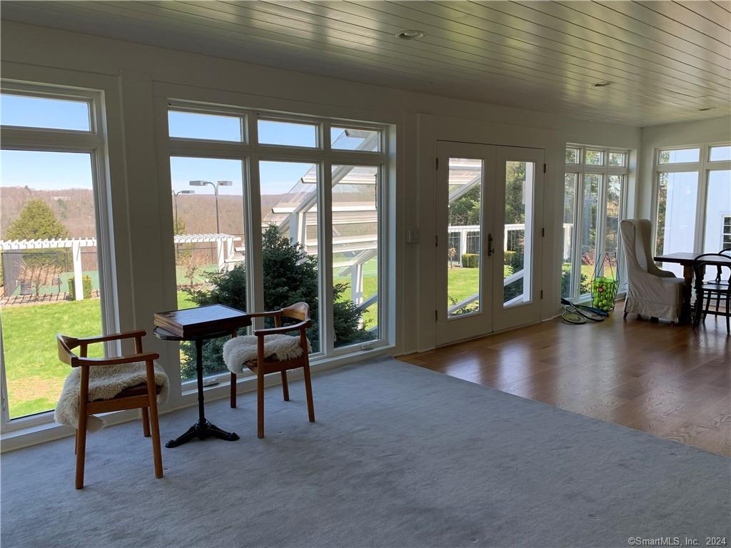 28 Leavenworth Road Woodbury, CT 06798 - Photo 14 of 37 a view of a livingroom with furniture and floor to ceiling window