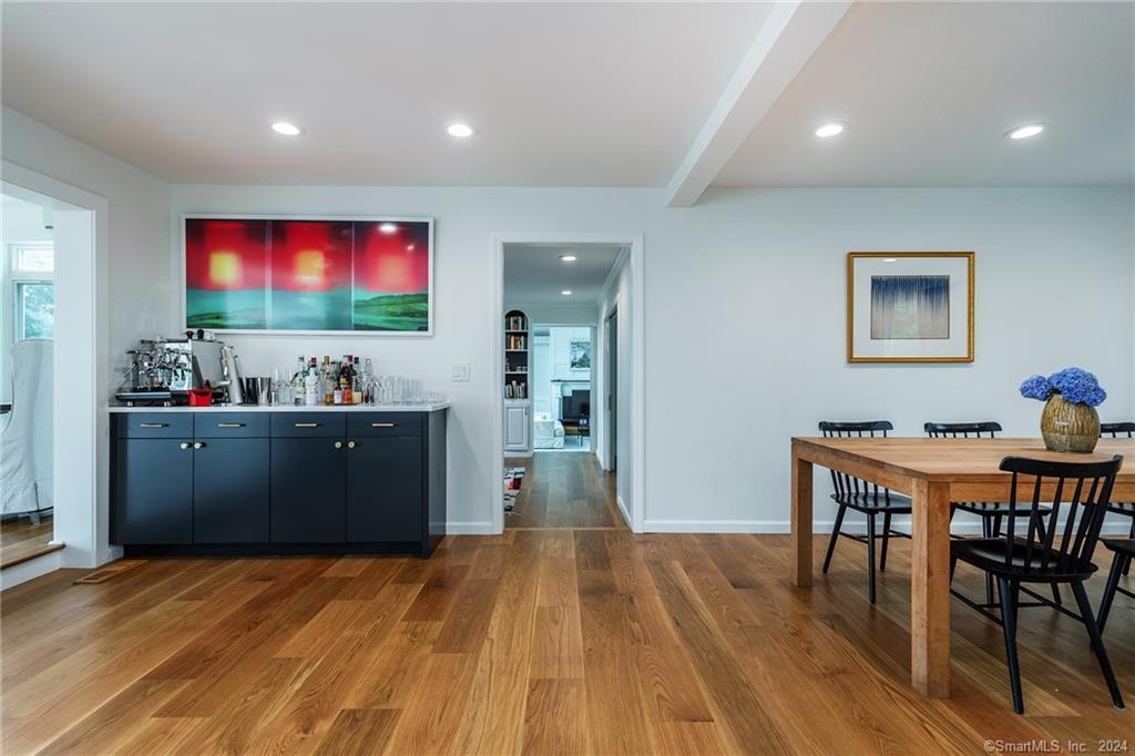 28 Leavenworth Road Woodbury, CT 06798 - Photo 15 of 37 a living room with furniture and a flat screen tv