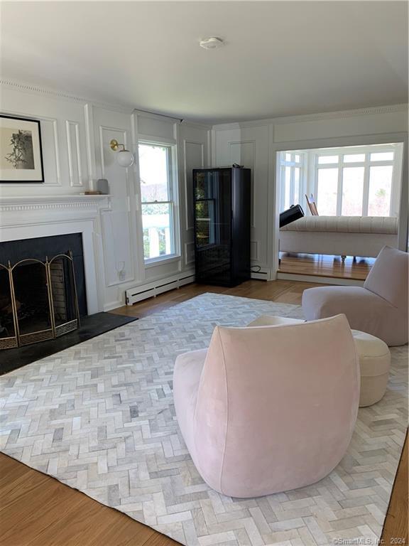 28 Leavenworth Road Woodbury, CT 06798 - Photo 18 of 37 a living room with furniture and a fireplace