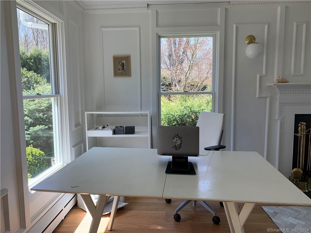 28 Leavenworth Road Woodbury, CT 06798 - Photo 21 of 37 a view of a dining room with furniture window and wooden floor
