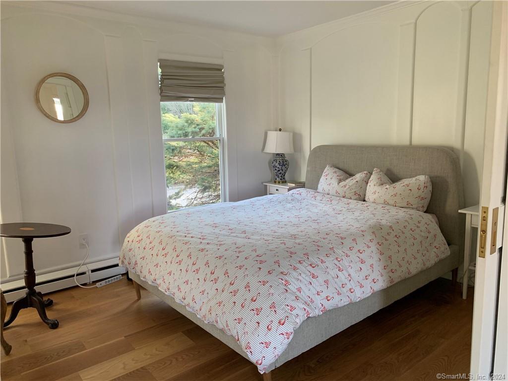 28 Leavenworth Road Woodbury, CT 06798 - Photo 26 of 37 a bedroom with a bed and window