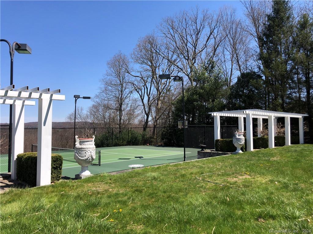 28 Leavenworth Road Woodbury, CT 06798 - Photo 32 of 37 a view of a house with backyard