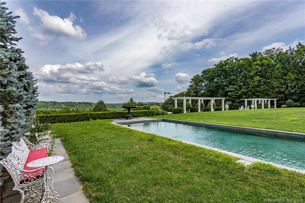 28 Leavenworth Road Woodbury, CT 06798 - Photo 35 of 37 a view of swimming pool with a garden