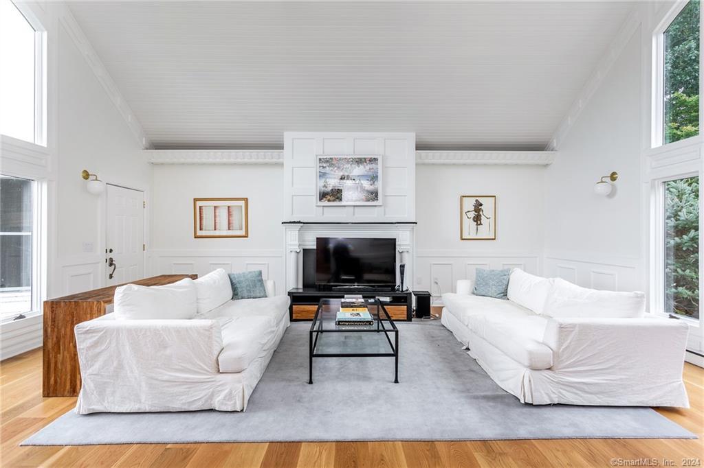 28 Leavenworth Road Woodbury, CT 06798 - Photo 4 of 37 a living room with furniture and a fireplace