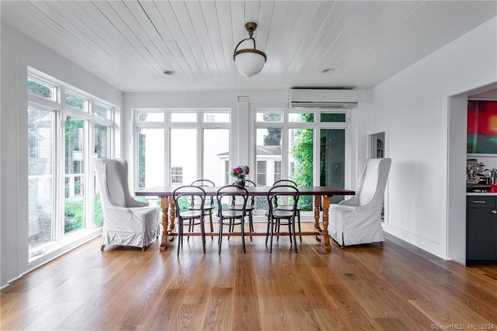 28 Leavenworth Road Woodbury, CT 06798 - Photo 10 of 37 a view of a livingroom with furniture window and wooden floor