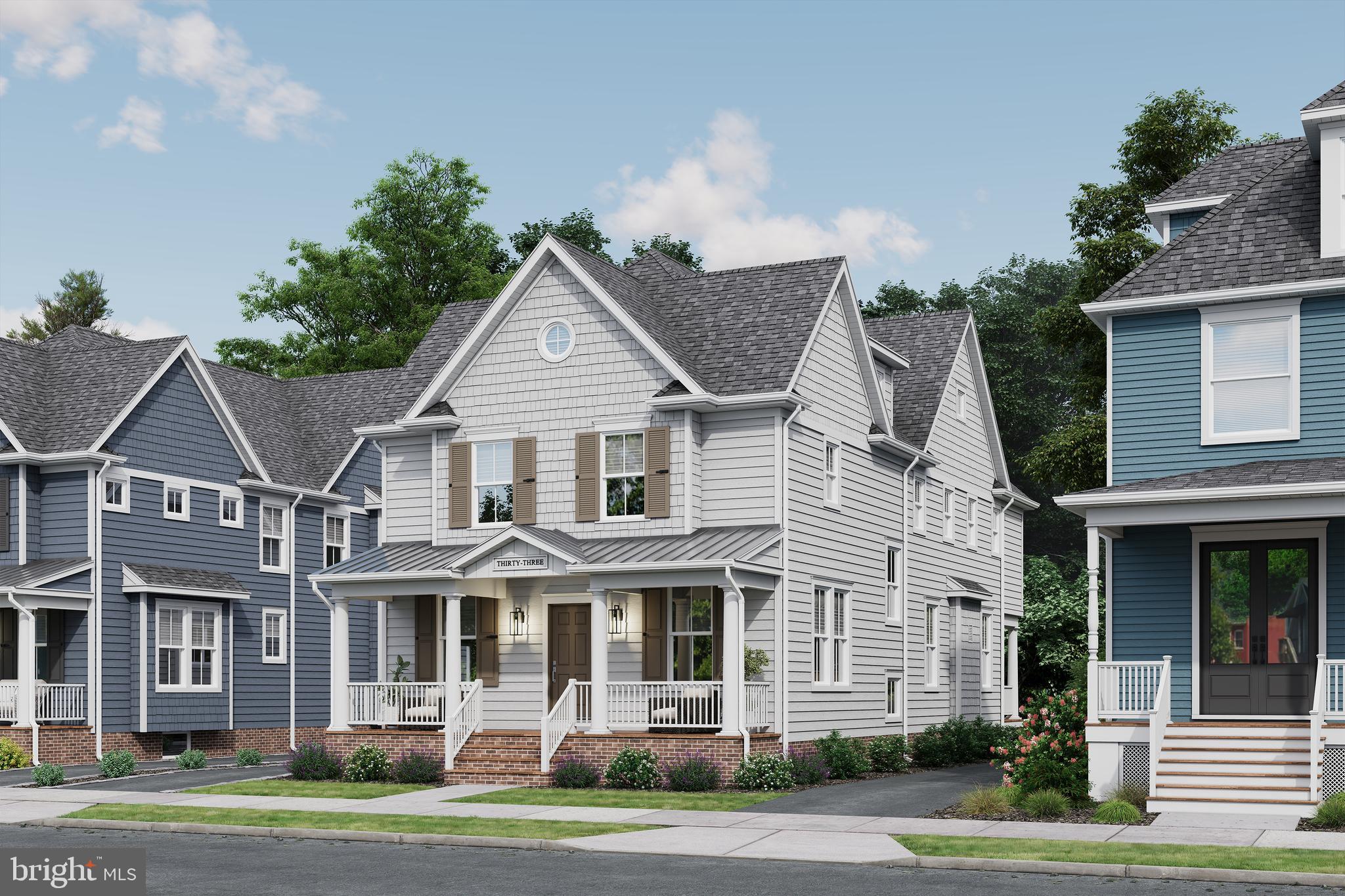 33 Estaugh Avenue Haddonfield, NJ 08033 - Photo 2 of 5 a view of a white house with a yard and plants